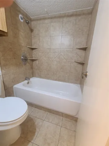 a view of empty room with windows