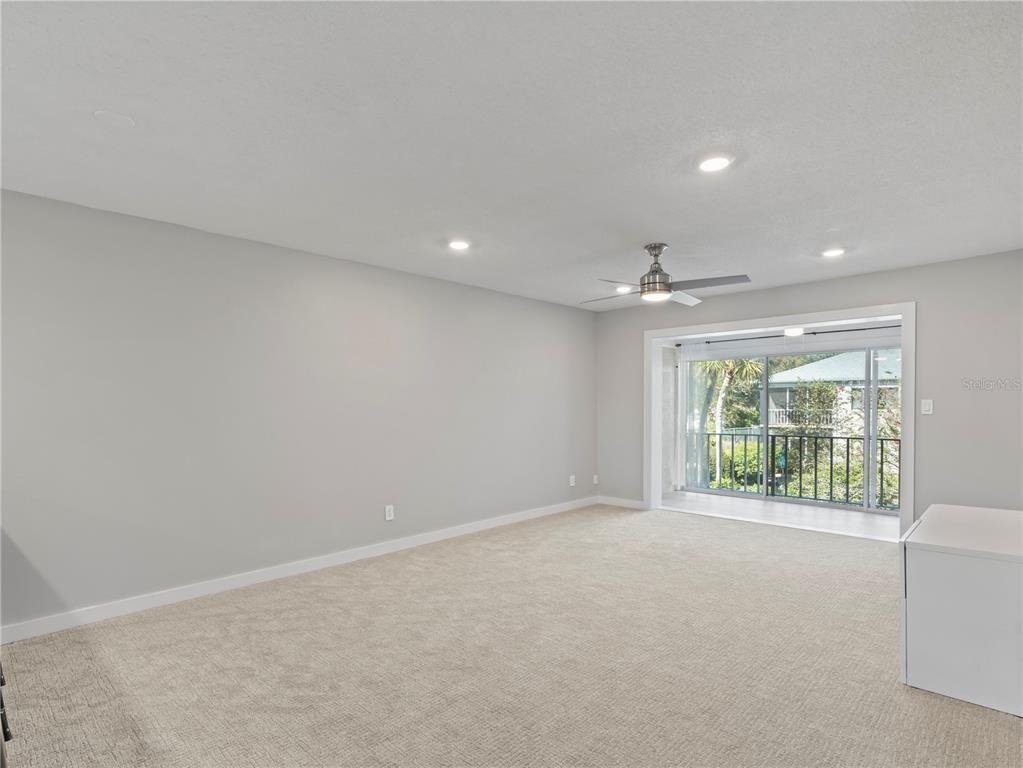 1250 South Denning Drive, Unit 213 Winter Park, FL 32789 - Photo 12 of 20 a view of an empty room with a window