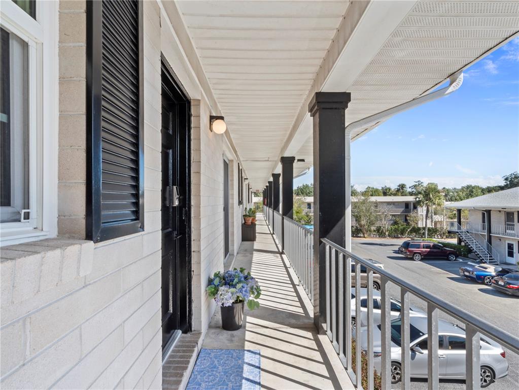 1250 South Denning Drive, Unit 213 Winter Park, FL 32789 - Photo 2 of 20 a view of a balcony with city view