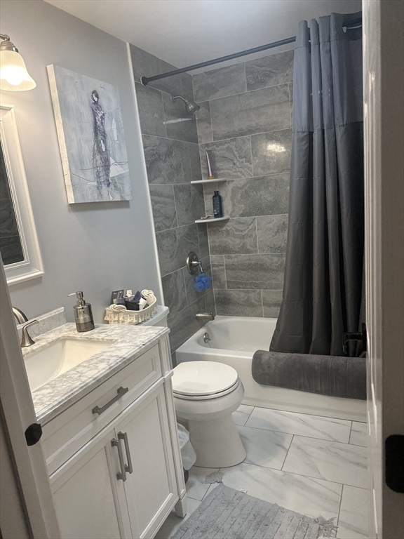 20 Nantucket Trail Sandwich, MA 02563 - Photo 17 of 30 a bathroom with a granite countertop sink a toilet a mirror and shower