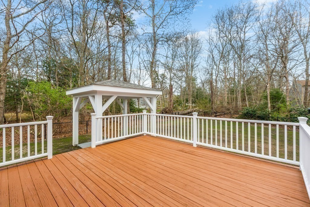 20 Nantucket Trail Sandwich, MA 02563 - Photo 21 of 30 a view of a wooden deck and trees