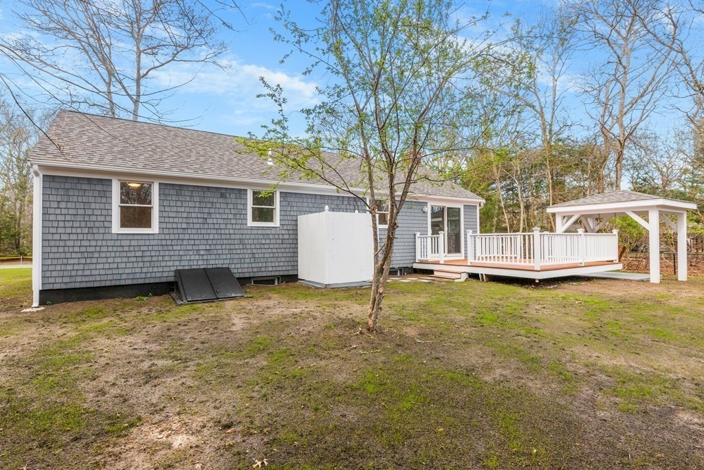 20 Nantucket Trail Sandwich, MA 02563 - Photo 28 of 30 a view of a house with a yard