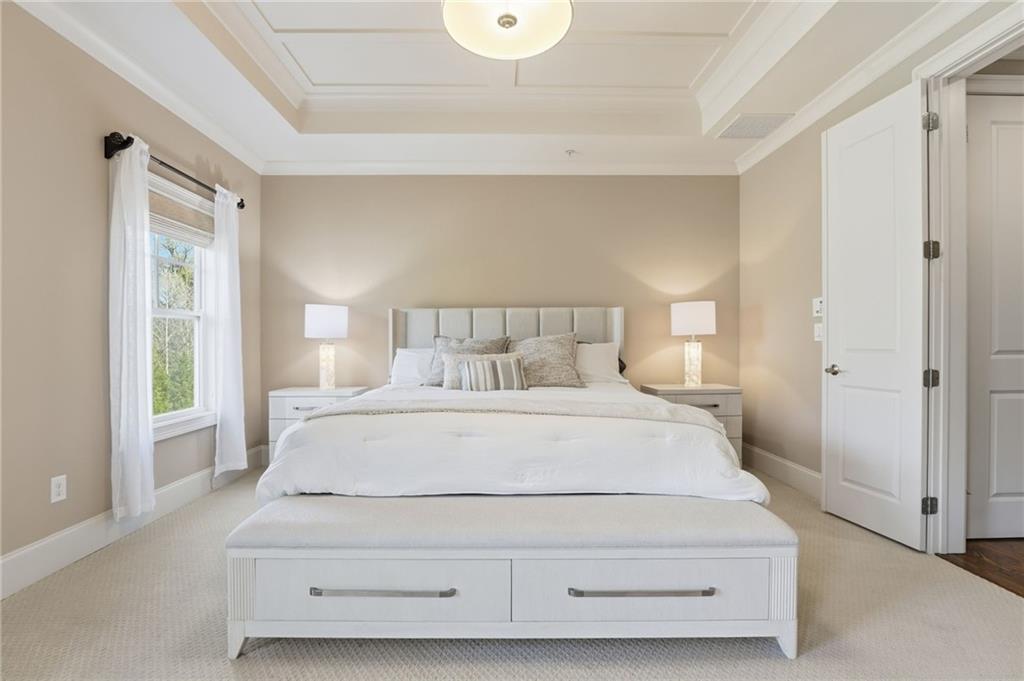 2085 Bellrick Road Northwest Atlanta, GA 30318 - Photo 28 of 78 a bedroom with a bed and a window