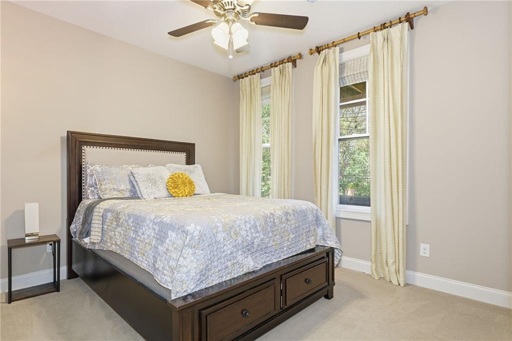 2085 Bellrick Road Northwest Atlanta, GA 30318 - Photo 55 of 78 a bedroom with a bed and window