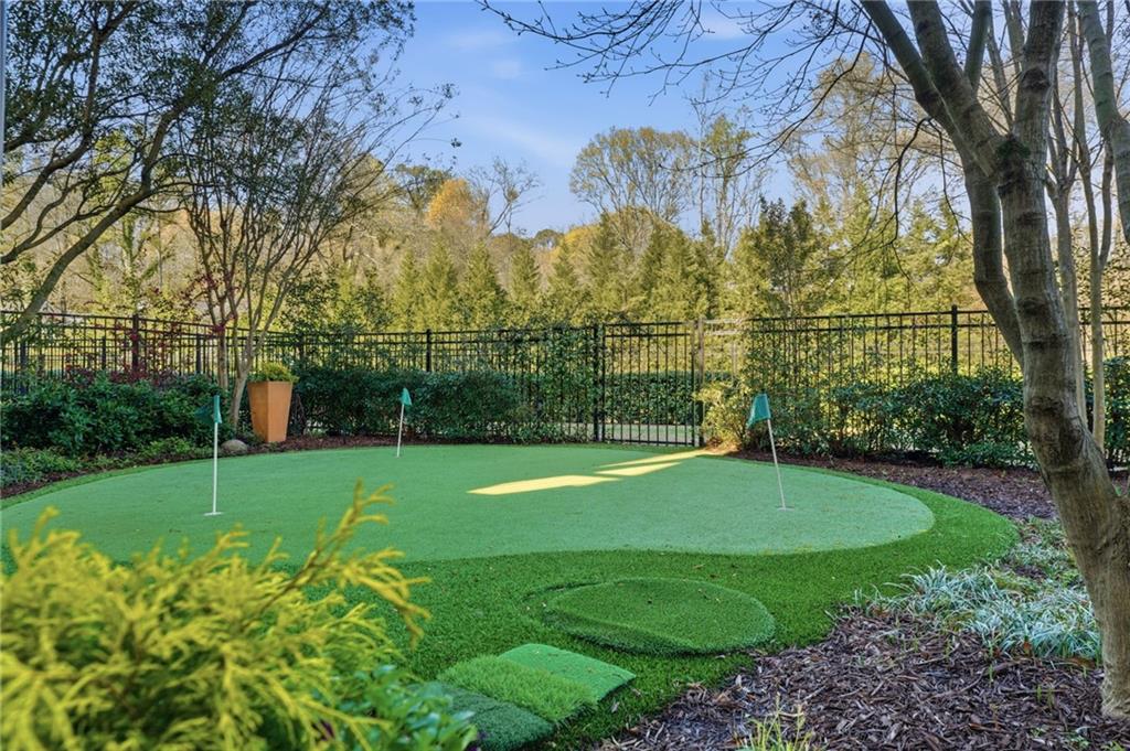 2085 Bellrick Road Northwest Atlanta, GA 30318 - Photo 63 of 78 a view of a field with a large tree
