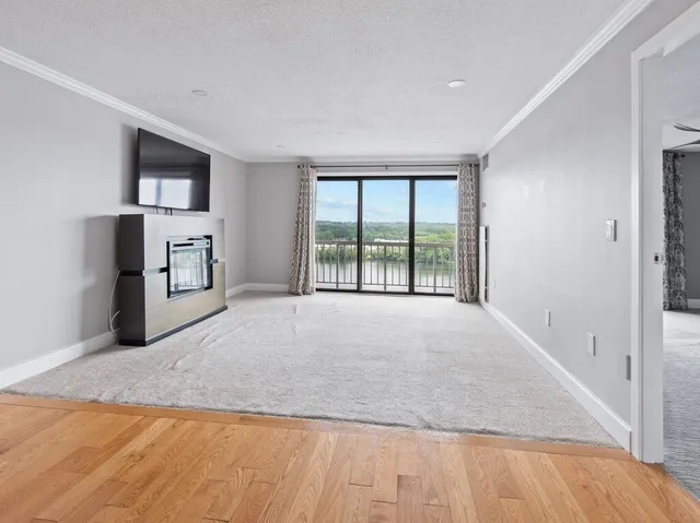 a big room with windows and closet