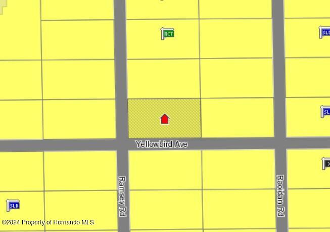 Lot 6 Ramsey Road Weeki Wachee, FL 34614 - Photo 2 of 2 a view of a glass door with a window