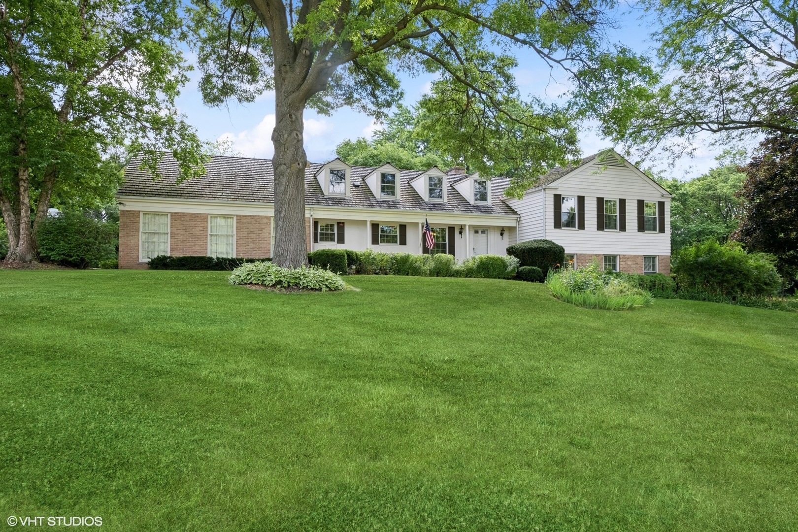 a house with a tree in front of it