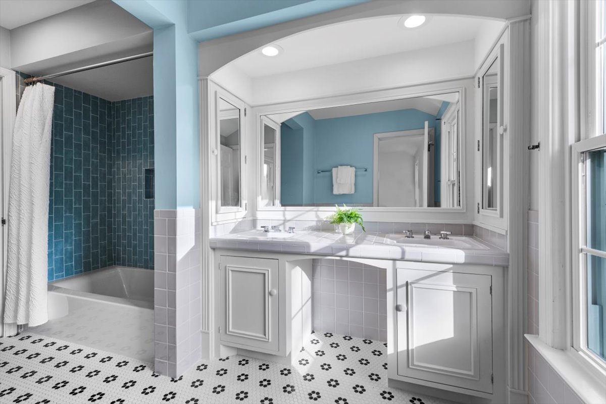 143 Firth Road Inverness, IL 60067 - Photo 27 of 38 a bathroom with a sink a toilet and shower