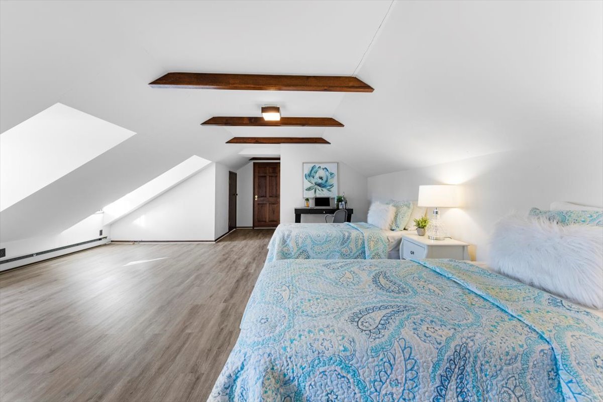 143 Firth Road Inverness, IL 60067 - Photo 29 of 38 a bedroom with a bed and a ceiling fan