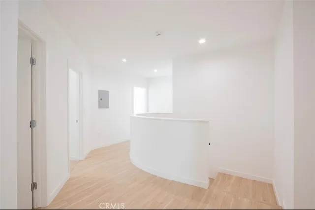 a view of a livingroom with wooden floor