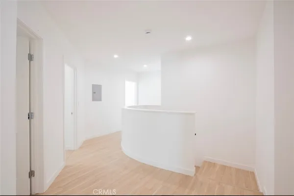 a view of a livingroom with wooden floor