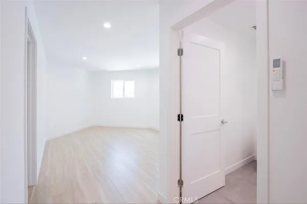 a bathroom with a toilet a sink and shower