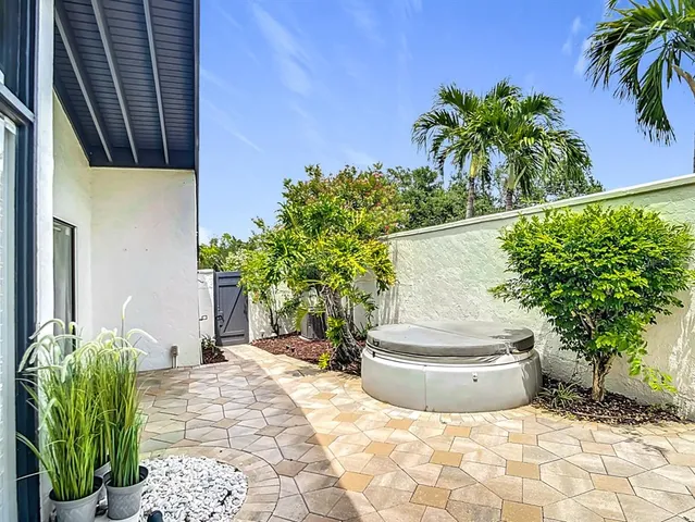 a view of a hallway with windows