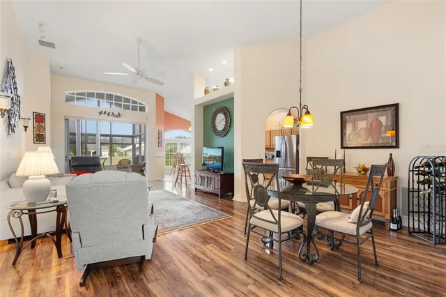 a view of a livingroom with furniture and a window