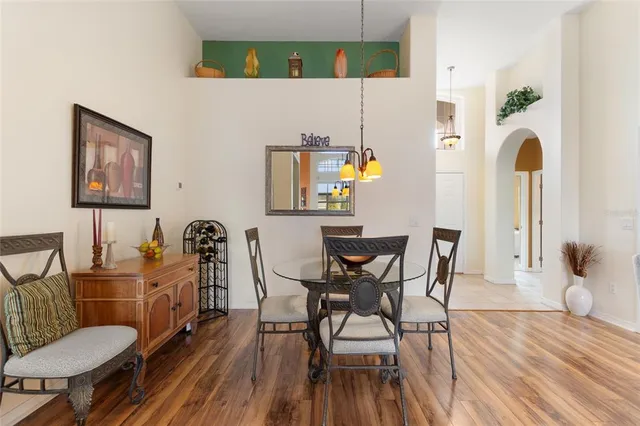 a lobby with furniture and floor to ceiling window