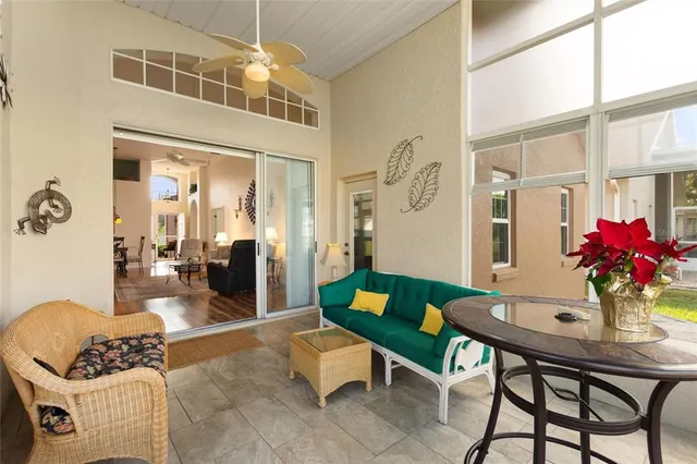 a kitchen with granite countertop a stove top oven microwave and cabinets