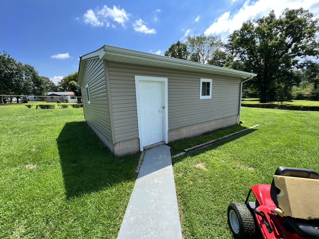 890 Hobbs Hill Road Tracy City, TN 37387 - Photo 18 of 31 a view of backyard with seating space