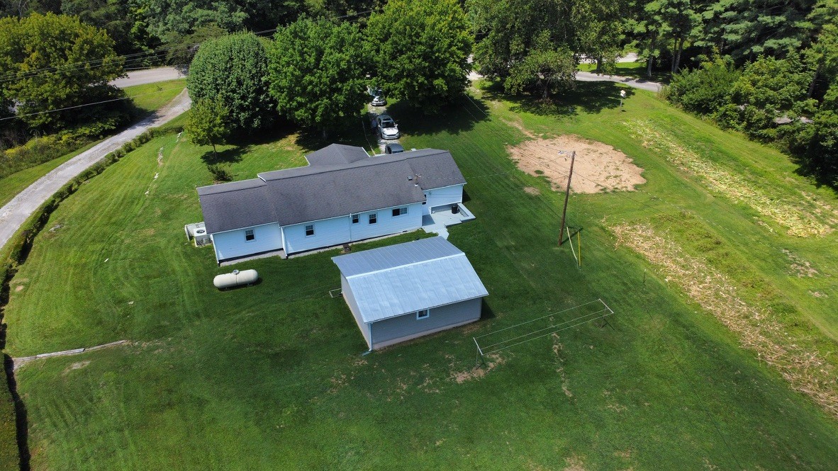890 Hobbs Hill Road Tracy City, TN 37387 - Photo 20 of 31 an aerial view of a house with outdoor space pool seating area and yard