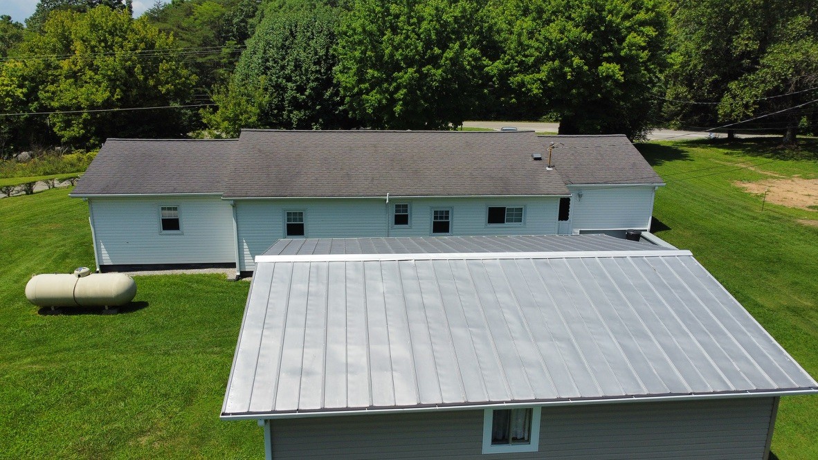 890 Hobbs Hill Road Tracy City, TN 37387 - Photo 22 of 31 a aerial view of a house with pool table and chairs