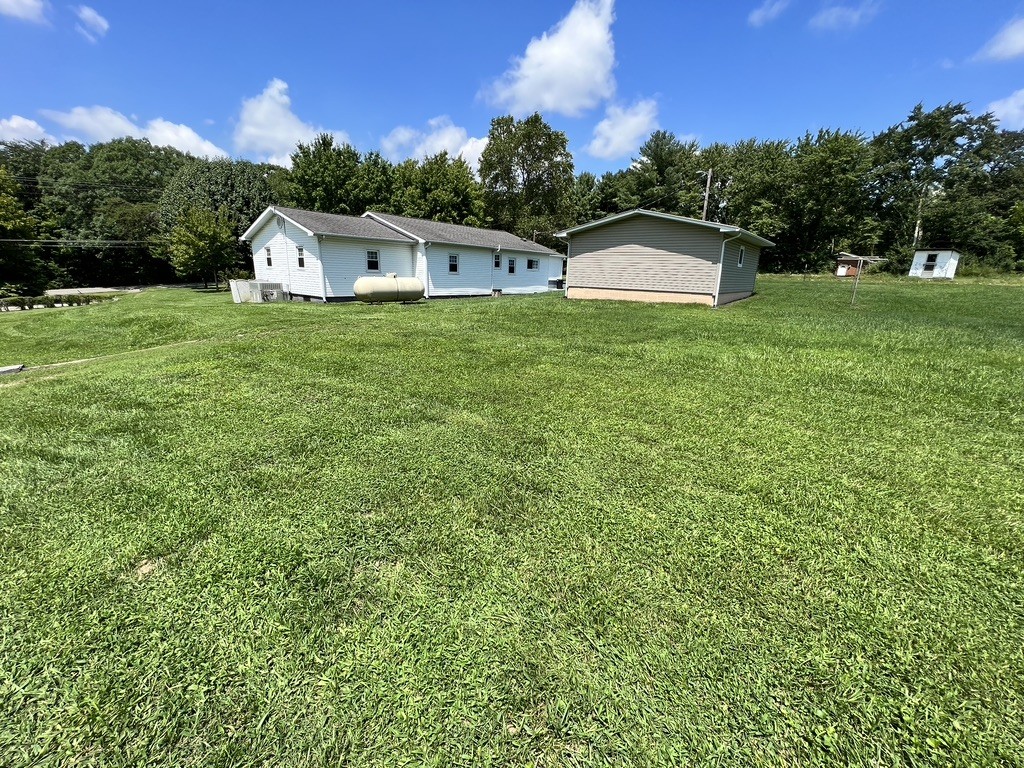 890 Hobbs Hill Road Tracy City, TN 37387 - Photo 27 of 31 a house view with a garden space