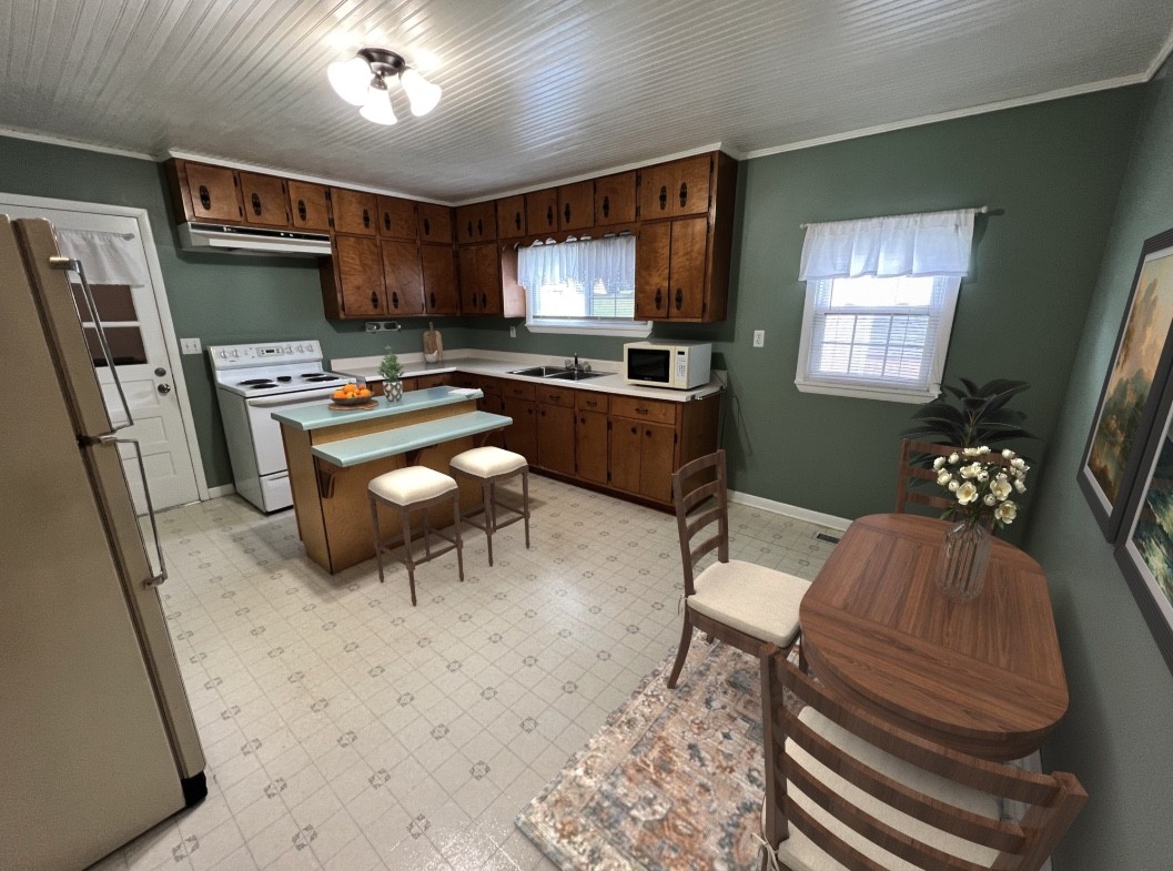 890 Hobbs Hill Road Tracy City, TN 37387 - Photo 5 of 31 a living room with furniture a rug and a flat screen tv