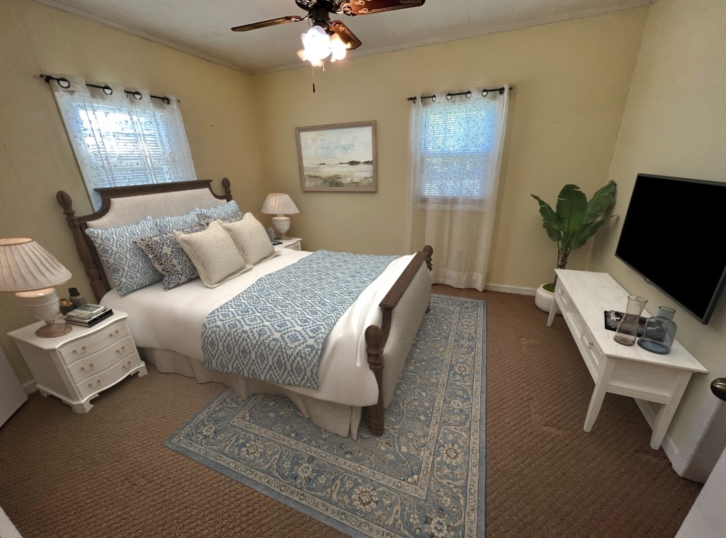 890 Hobbs Hill Road Tracy City, TN 37387 - Photo 10 of 31 a bedroom with furniture and a window