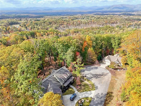 a view of a yard with an outdoor space