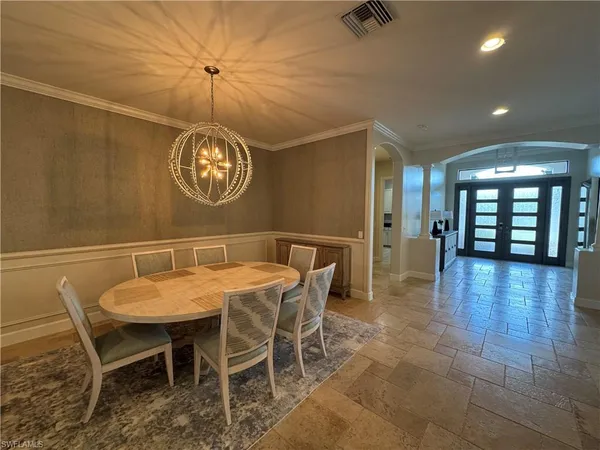 a view of a dining room with furniture