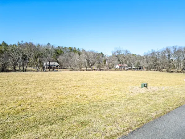 a view of an ocean and mountain