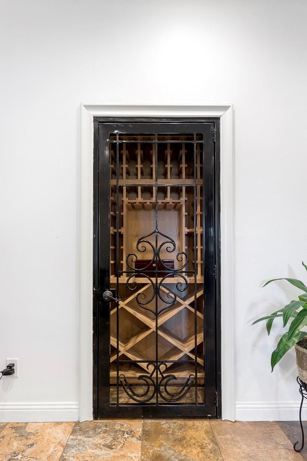 1155 Whipporwill Road Conroe, TX 77303 - Photo 14 of 34 a view of a door and chair in the patio
