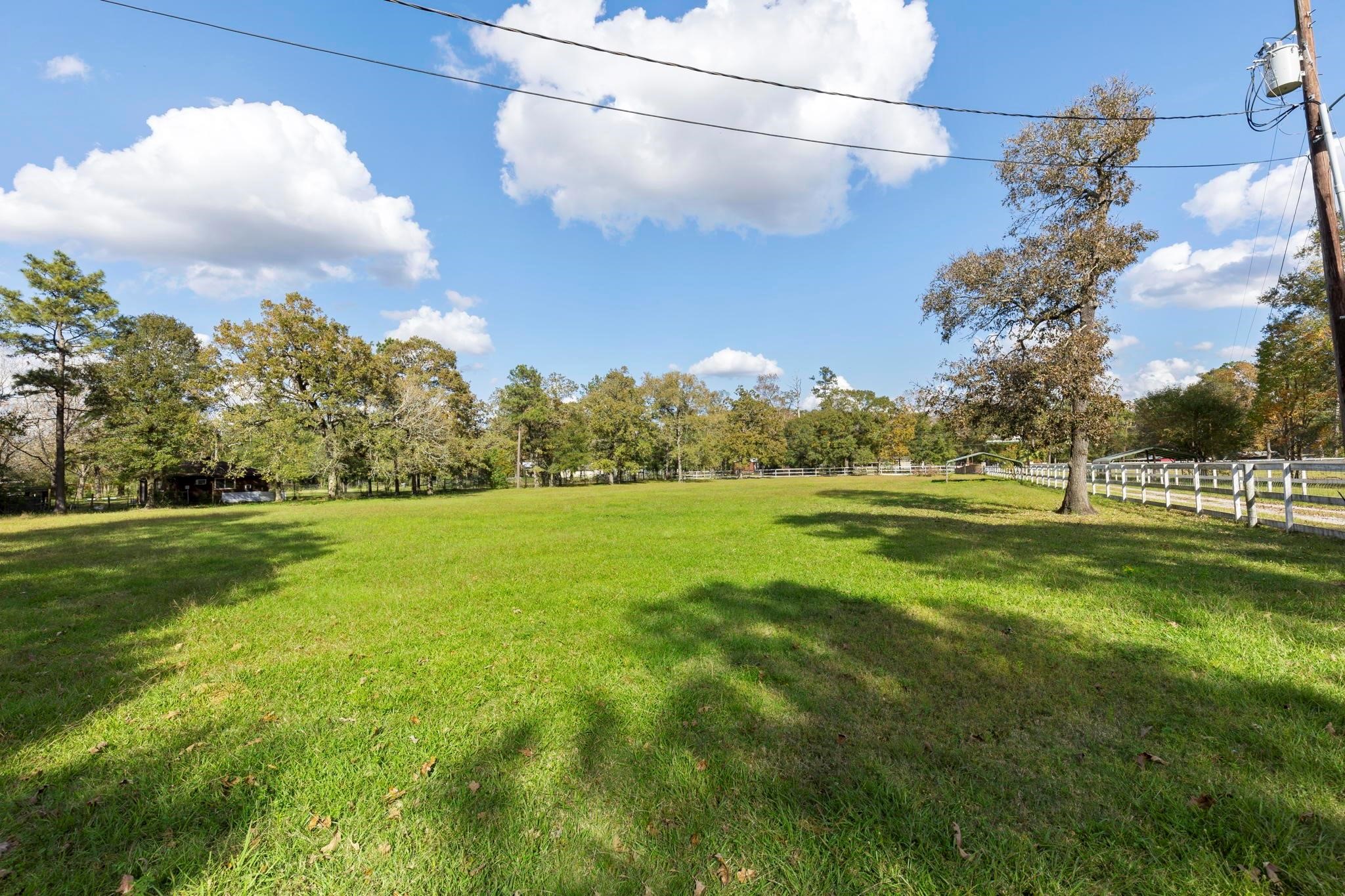1155 Whipporwill Road Conroe, TX 77303 - Photo 10 of 34 View of Front Pasture That Leads to Home