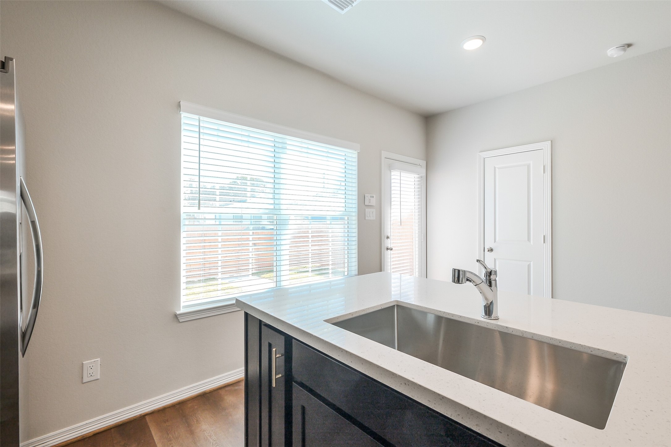 6407 Paris Street Houston, TX 77021 - Photo 13 of 31 a view of a kitchen with a sink and large window
