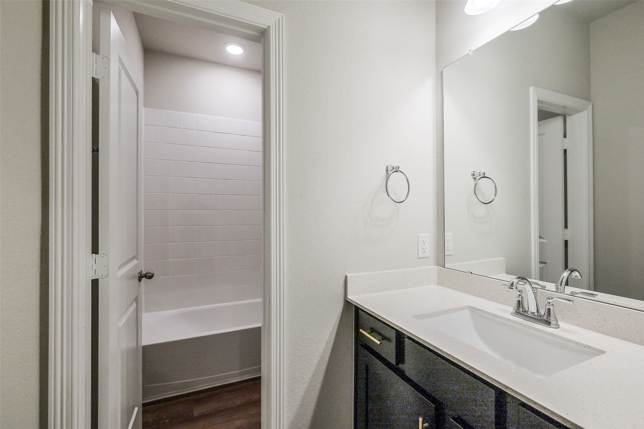 6407 Paris Street Houston, TX 77021 - Photo 26 of 31 a bathroom with a granite countertop sink a toilet and shower