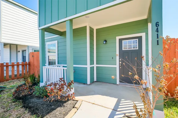 a view of a house with a garden