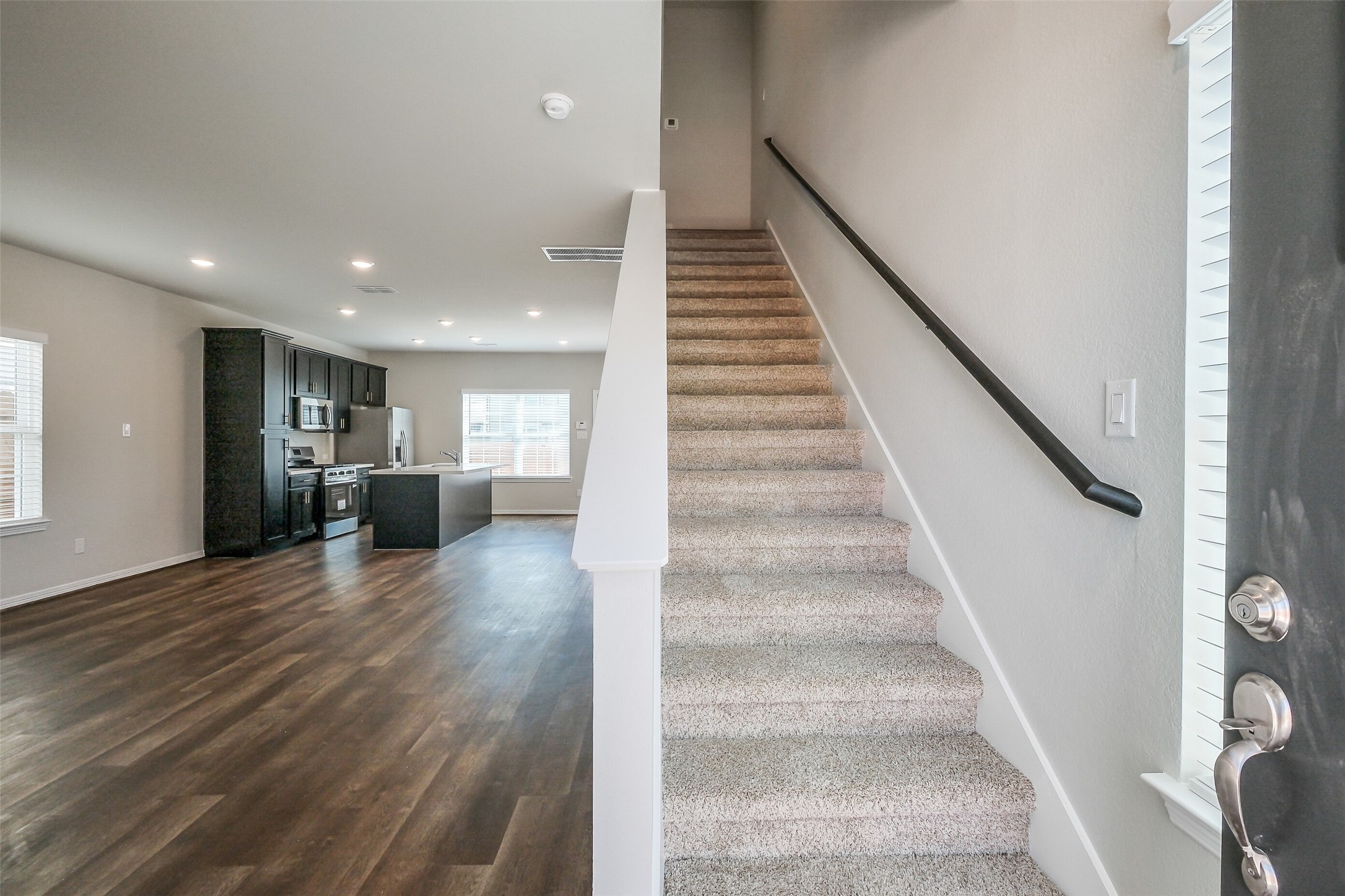 6407 Paris Street Houston, TX 77021 - Photo 5 of 31 a view of entryway and hall with wooden floor