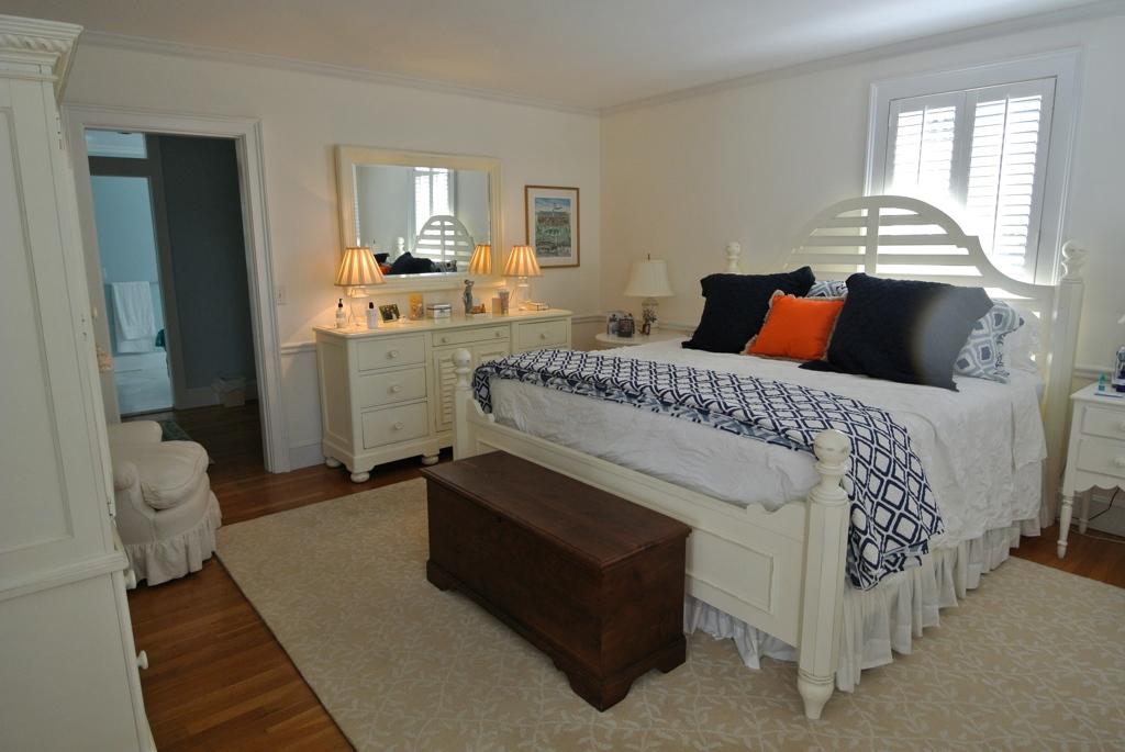 14 Ice Valley Road Osterville, MA 02655 - Photo 17 of 35 a spacious bedroom with a bed and a dresser