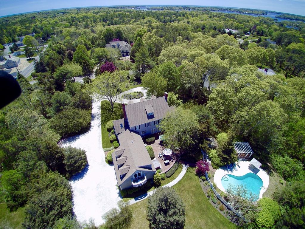 14 Ice Valley Road Osterville, MA 02655 - Photo 2 of 35 an aerial view of residential house with outdoor space and trees all around