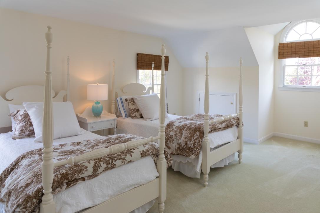 14 Ice Valley Road Osterville, MA 02655 - Photo 22 of 35 a bedroom with a bed and a night stand