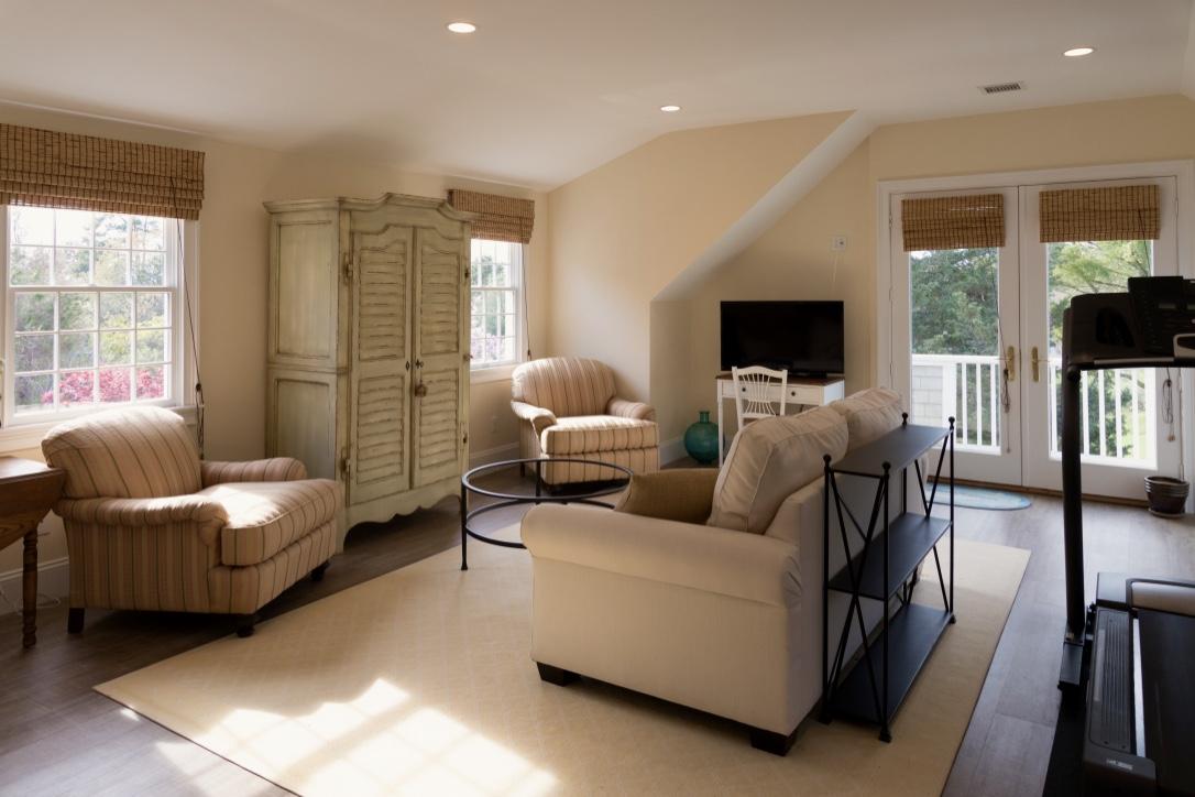 14 Ice Valley Road Osterville, MA 02655 - Photo 23 of 35 a living room with furniture and a flat screen tv