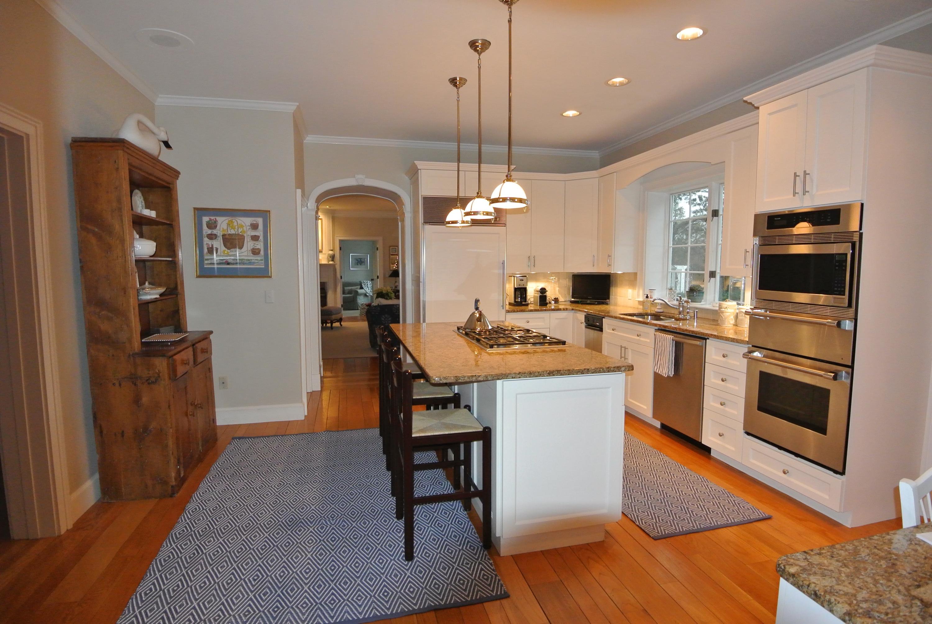 14 Ice Valley Road Osterville, MA 02655 - Photo 9 of 35 a kitchen with a sink appliances and cabinets