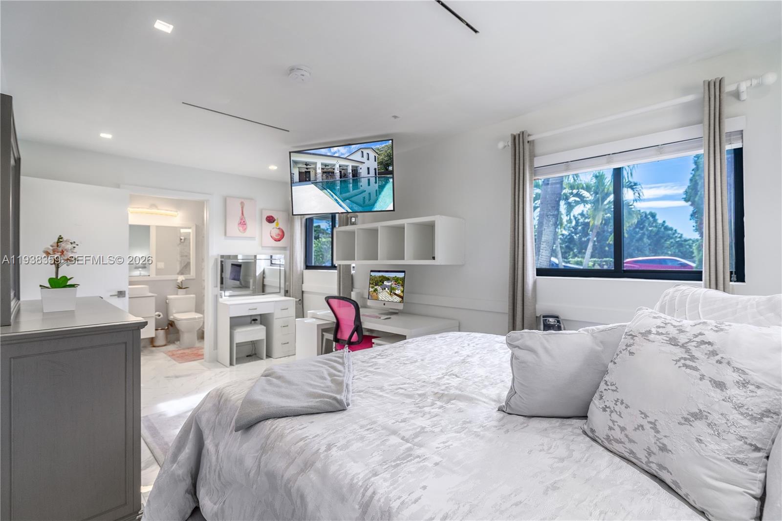 20221 Southwest 318th Street Homestead, FL 33030 - Photo 16 of 37 a bedroom with a bed and wooden floor