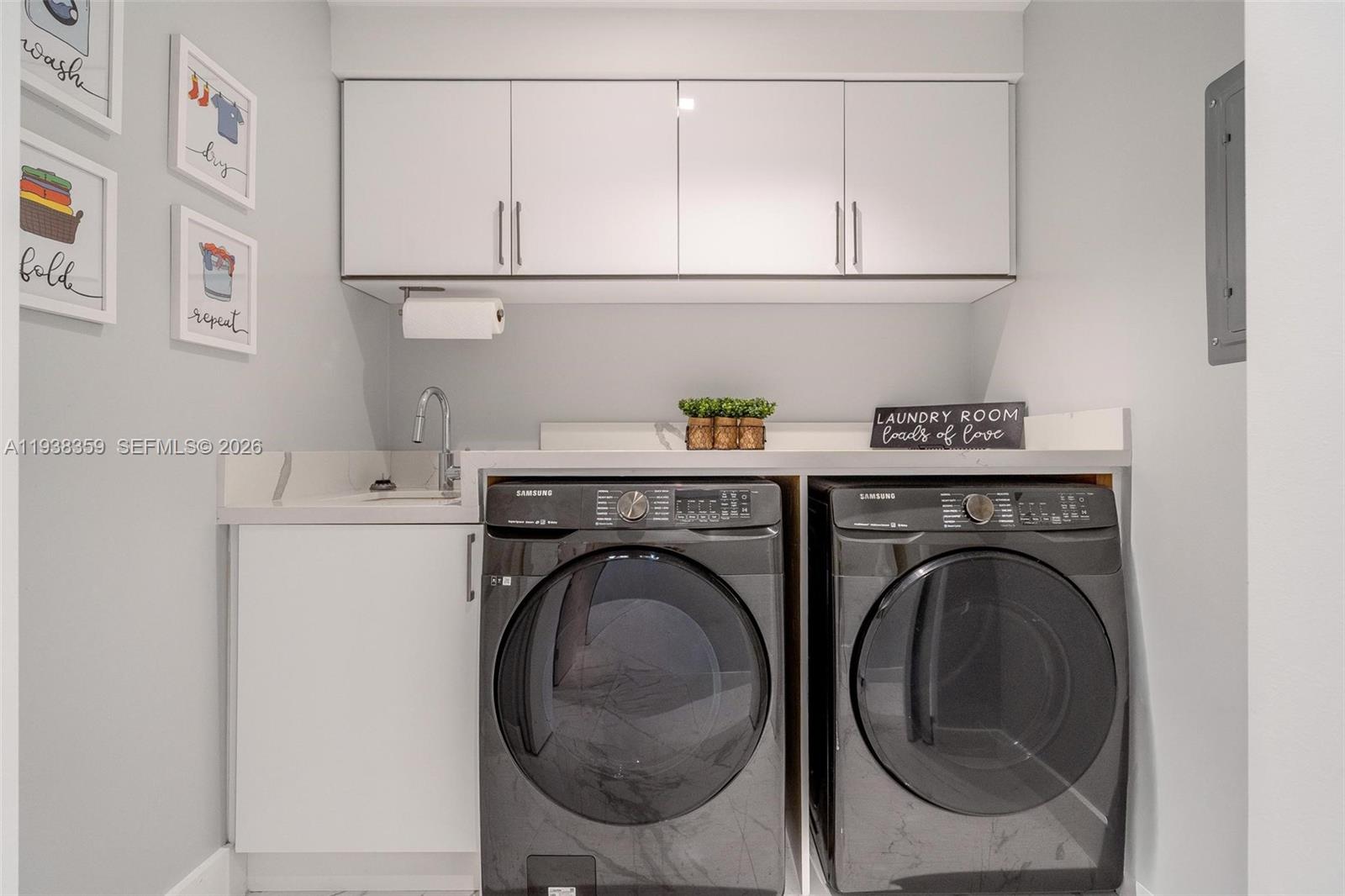 20221 Southwest 318th Street Homestead, FL 33030 - Photo 24 of 37 a utility room with dryer and washer