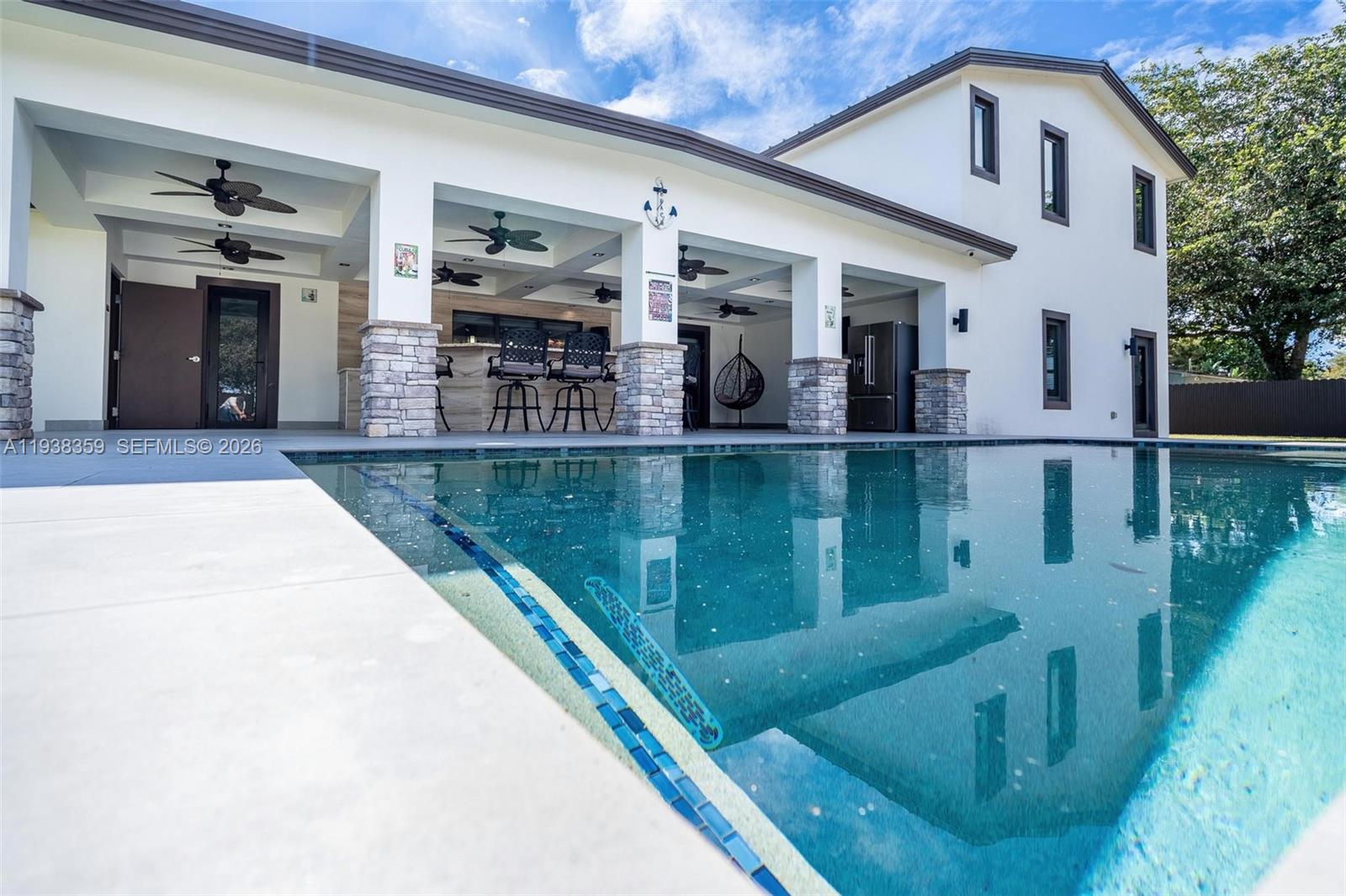 20221 Southwest 318th Street Homestead, FL 33030 - Photo 30 of 37 a view of a house with pool