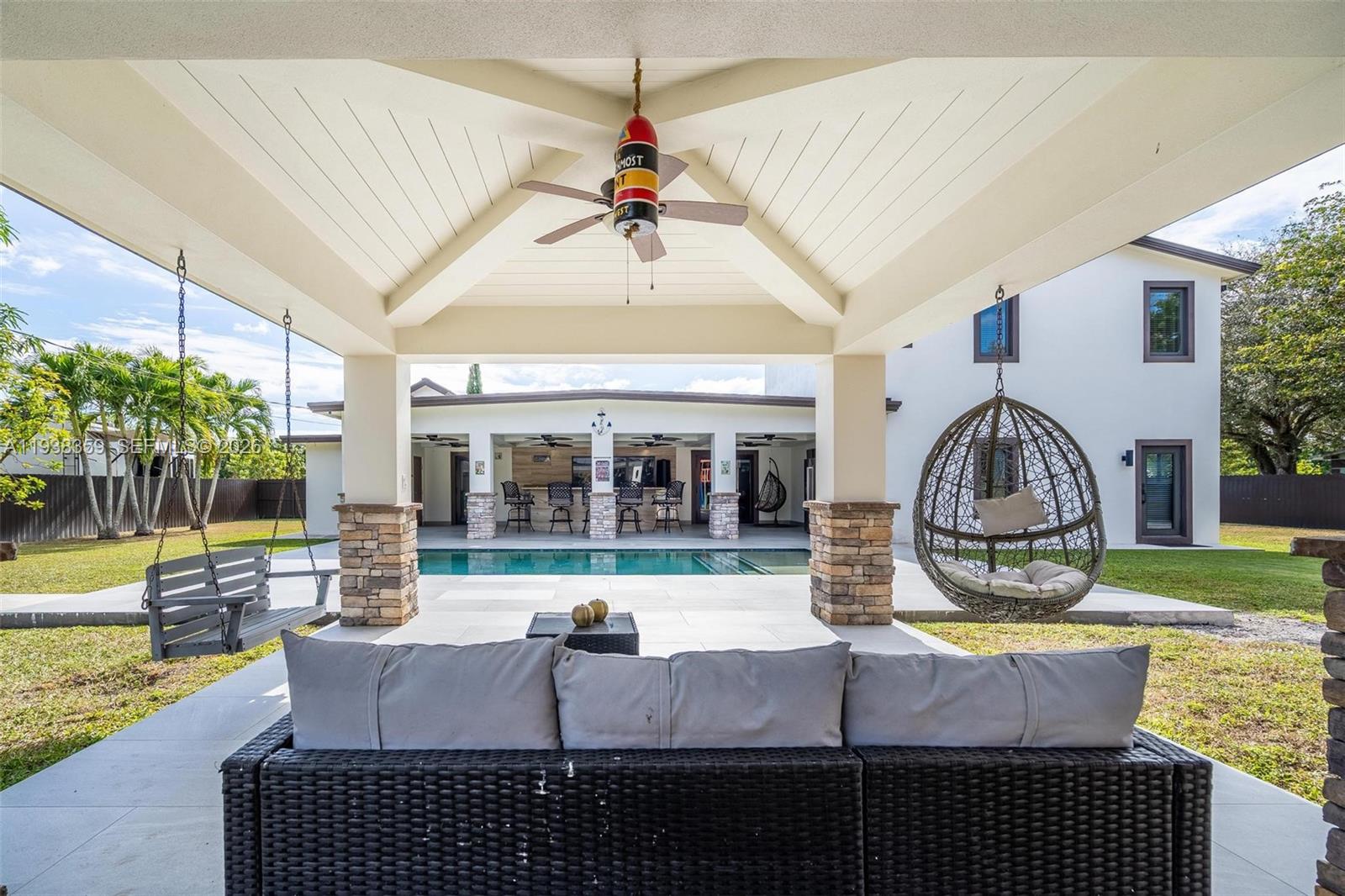 20221 Southwest 318th Street Homestead, FL 33030 - Photo 33 of 37 a view of house with backyard and furniture