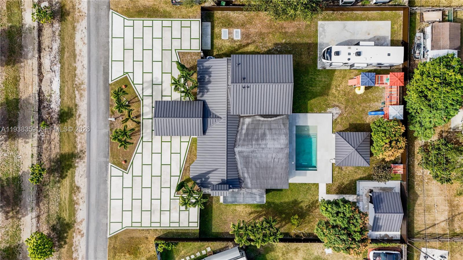 20221 Southwest 318th Street Homestead, FL 33030 - Photo 37 of 37 an aerial view of residential houses with outdoor space