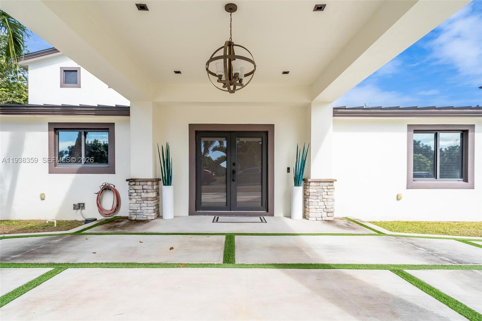 20221 Southwest 318th Street Homestead, FL 33030 - Photo 4 of 37 a view of a entryway door front of house