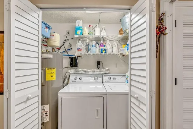 a utility room with dryer and washer