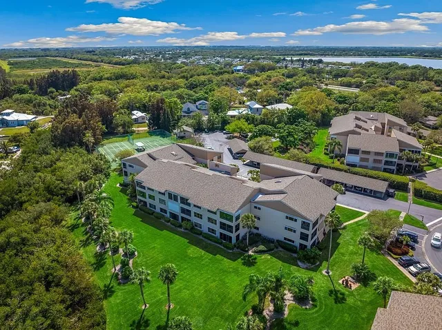 an aerial view of a house with a garden