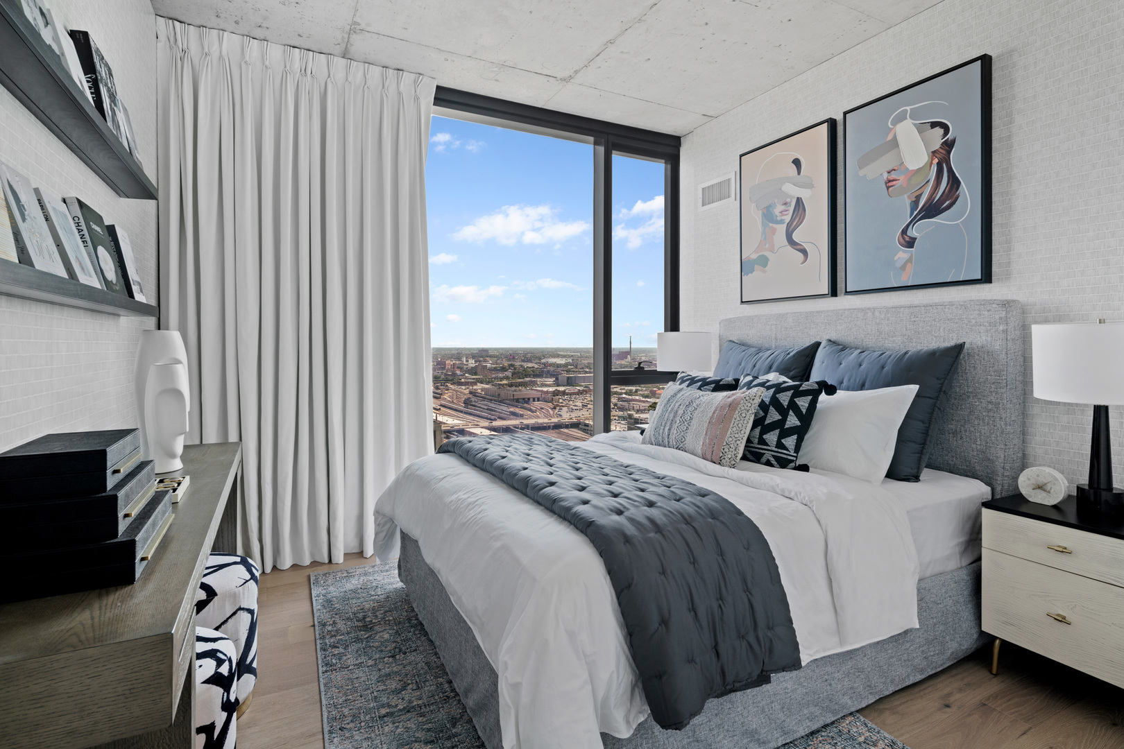 234 West Polk Street, Unit 2509 Chicago, IL 60607 - Photo 15 of 36 a bedroom with a bed painting on wall and a large window